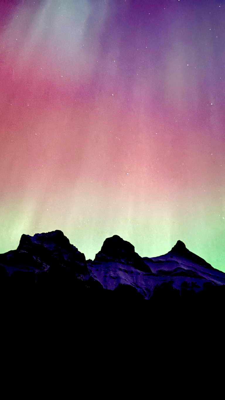 Northern Lights over Three Sisters mountain in Canmore Alberta 2024